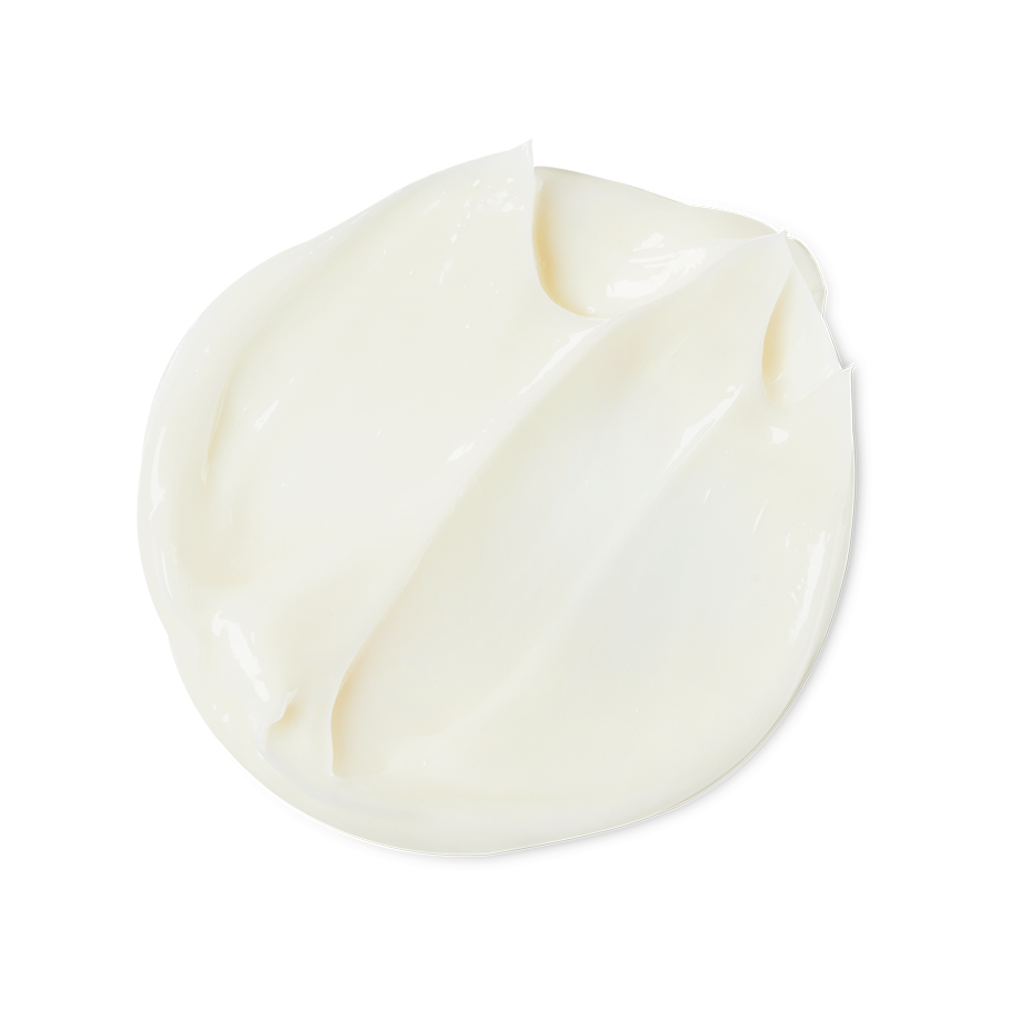 American Cream. A round, smooth dollop of thick, cream-coloured hair conditioner. The glossy product shows a rich texture, with distinct ridges and soft peaks where it has been swirled.